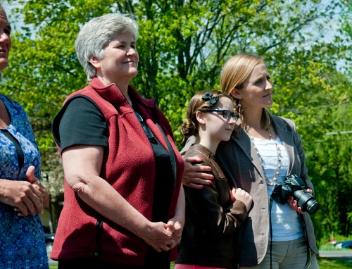 Mary Laskey, finance director for the Guardian House, stands with Egan Mills, 13, and her cousin Terri Wilson, volunteer, during a speech at the homeless shelter in Ballston Spa, N.Y., May 17. (U.S. Army photo by Sgt. 1st Class Michel Sauret)